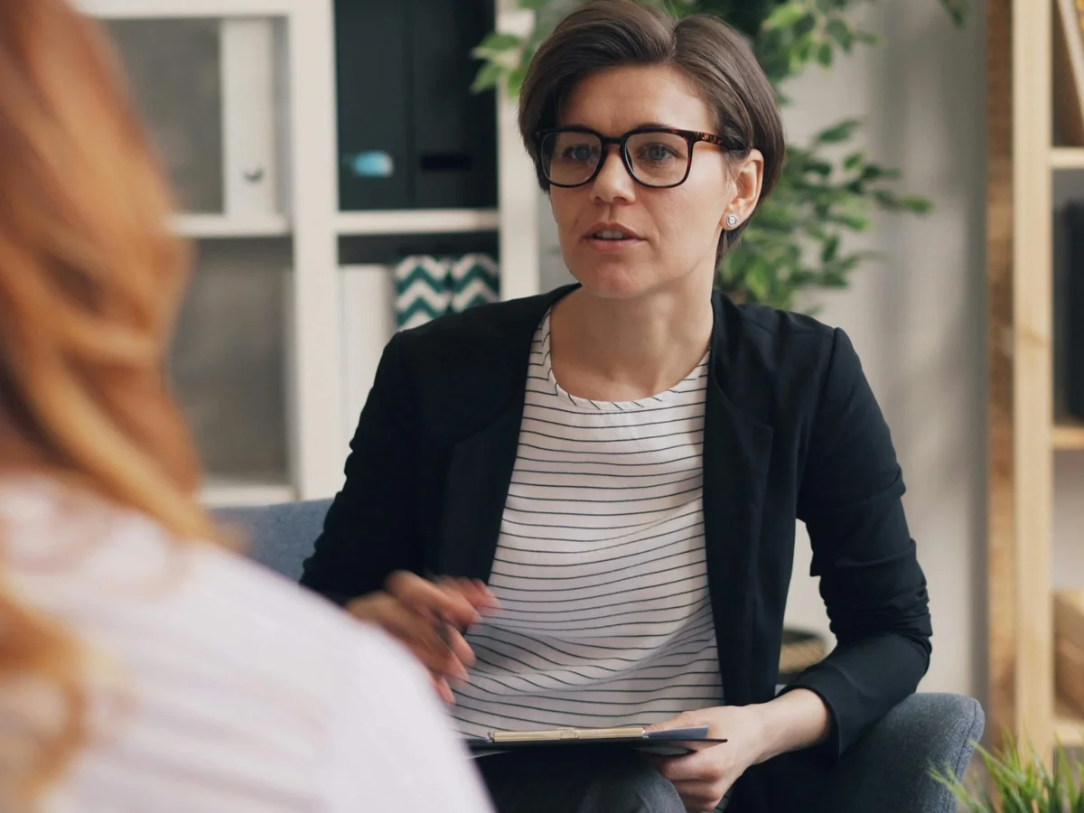 Therapist listening attentively during an individual counseling session